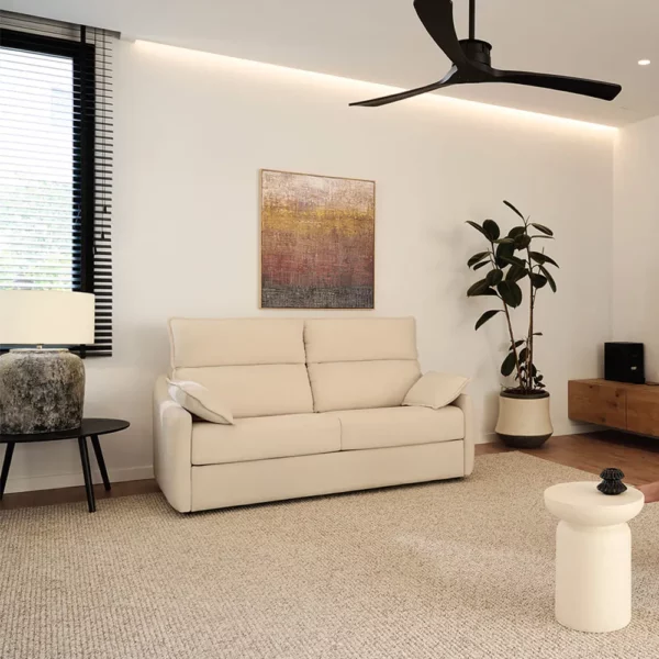 Sofá cama modelo UN de frente en un salón