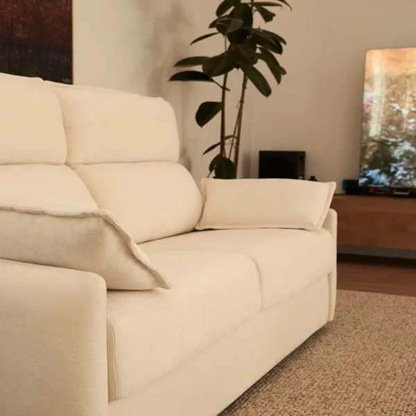 Sofá cama modelo UN en detalle en un salón